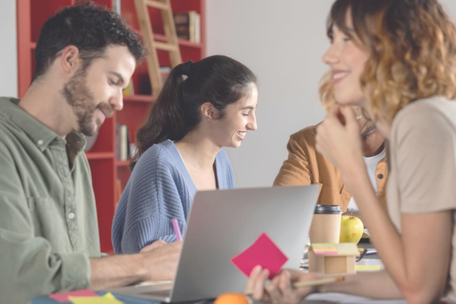 Family reviewing financial documents together at kitchen table