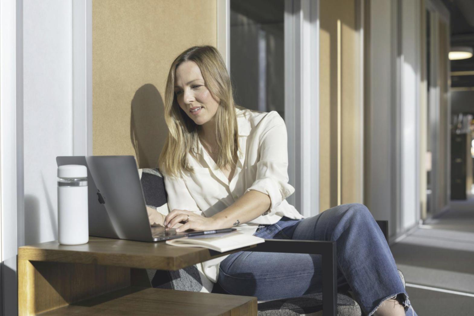 Professional financial planning session with documents and charts